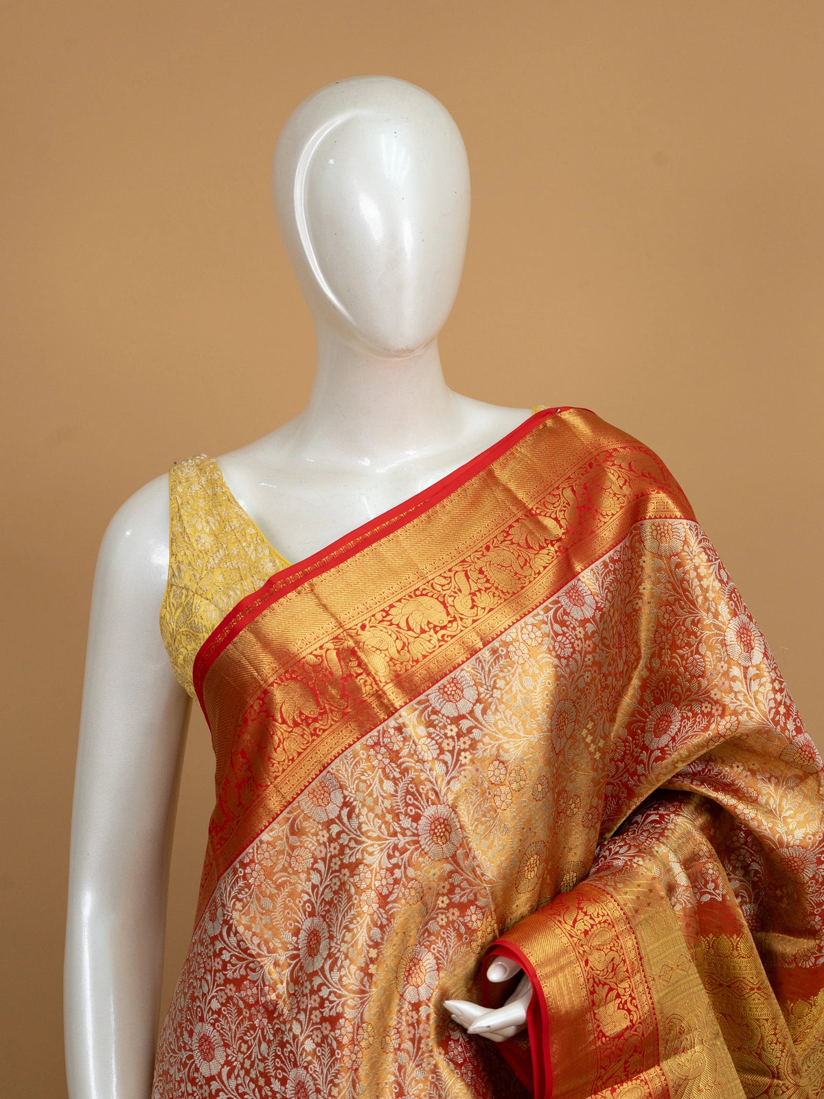 Golden orange and red pure Kanchipuram silk saree with gold zari floral brocade and contrast red peacock border