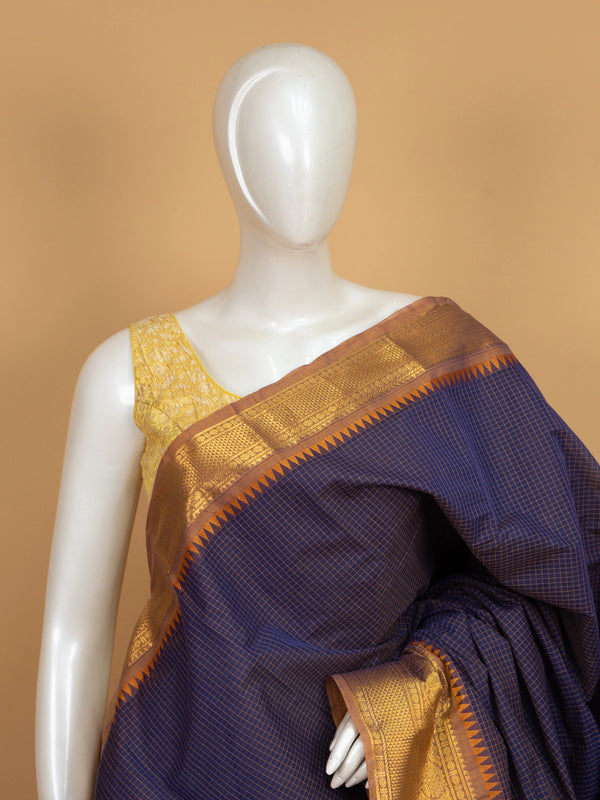 Navy blue Chettinad cotton saree with mustard-gold checks and contrast gold zari temple border