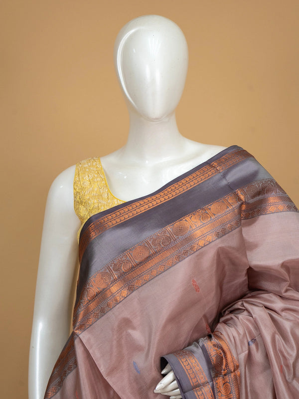 Mauve banana silk saree with navy blue copper zari border and pallu