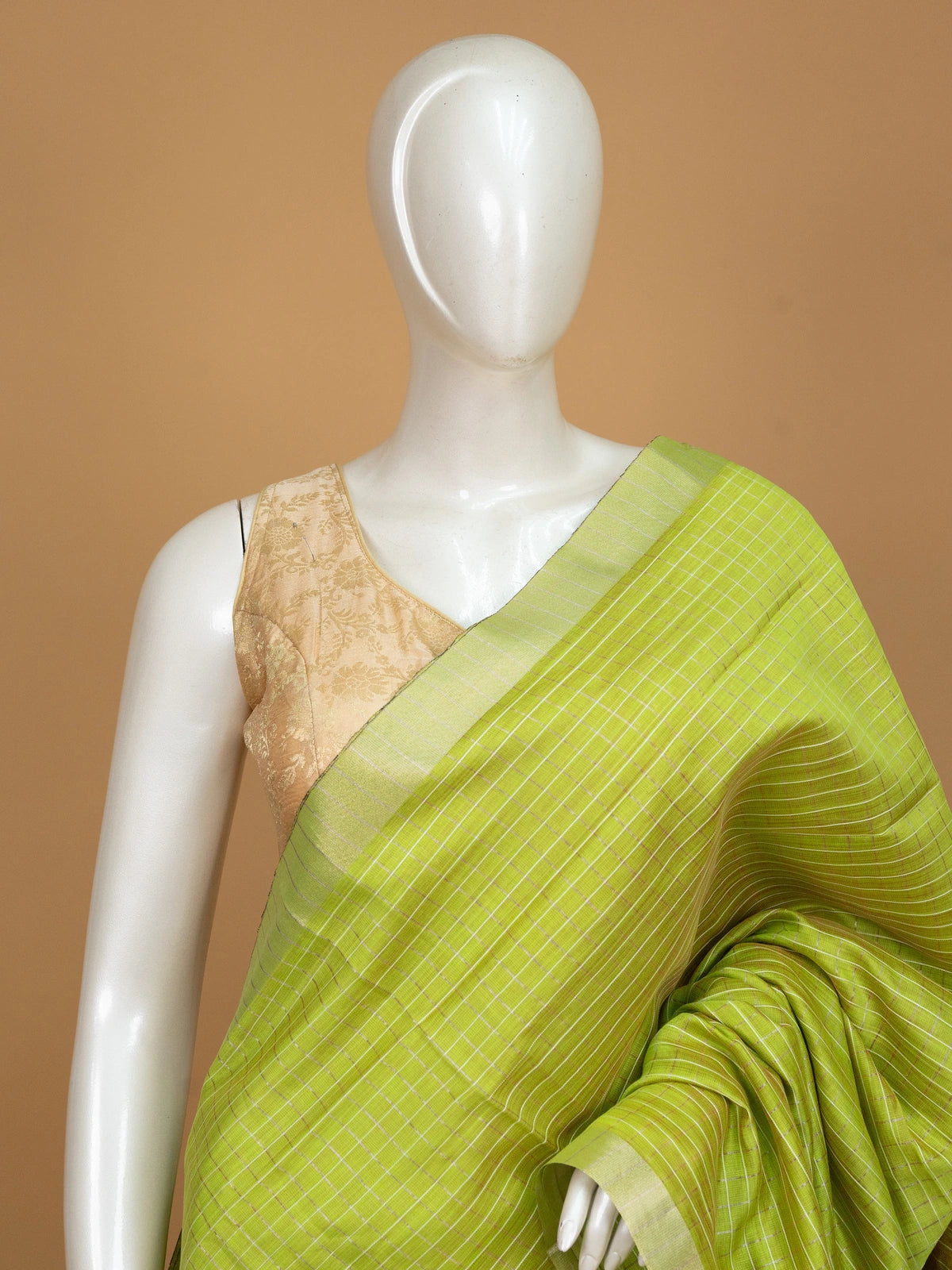 Lime green Linen Cotton saree with woven checks, contrast pink pallu and yellow-gold zari border