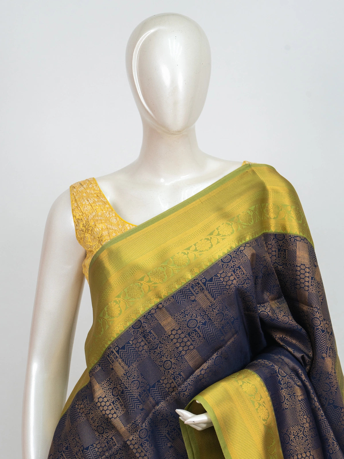 Navy blue Kanchipuram fancy silk saree with gold zari brocade body and contrast lime-green zari border