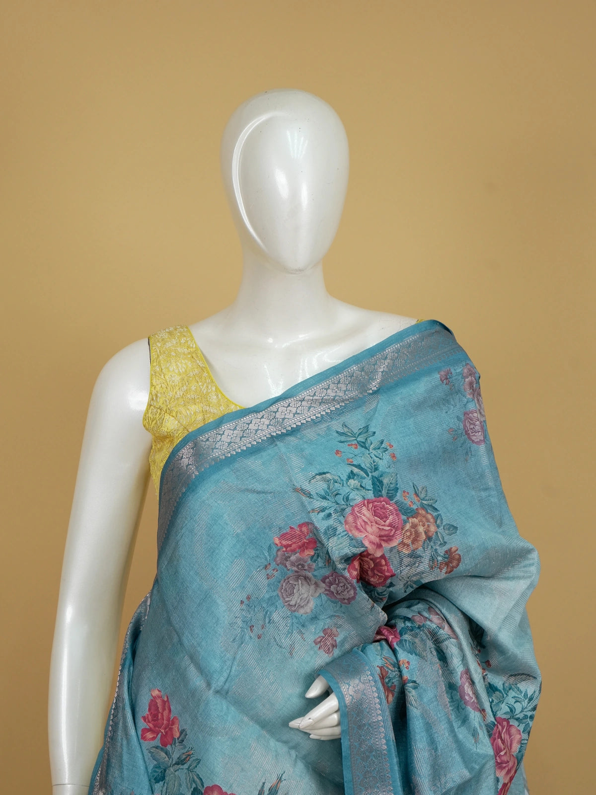 Sky blue semi tussar saree with pink rose floral print and silver zari border