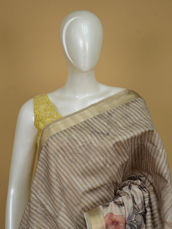 Beige linen cotton saree with tropical floral hummingbird print and gold zari border