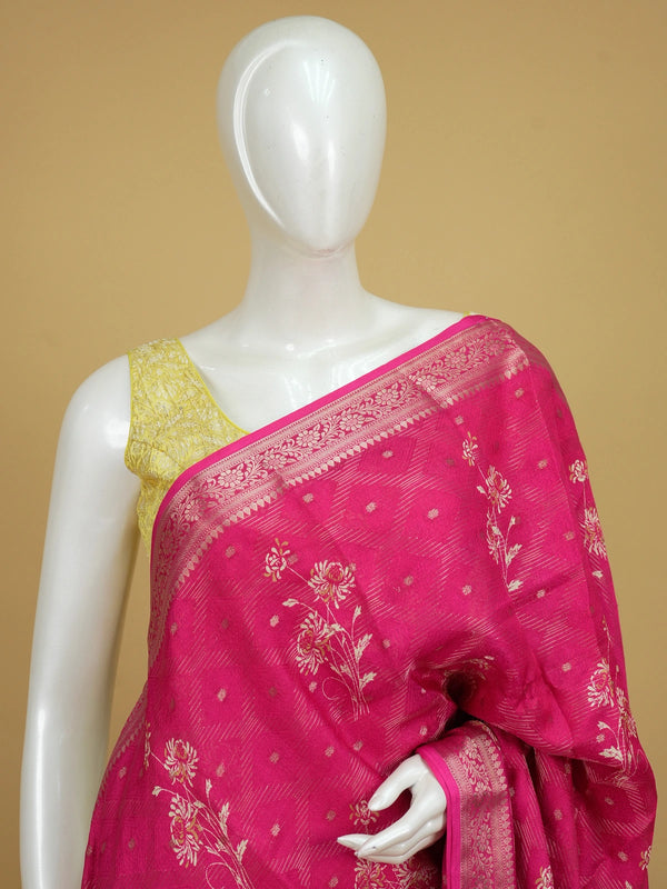 Rani pink designer saree with floral motifs, gold zari butti and woven zari border