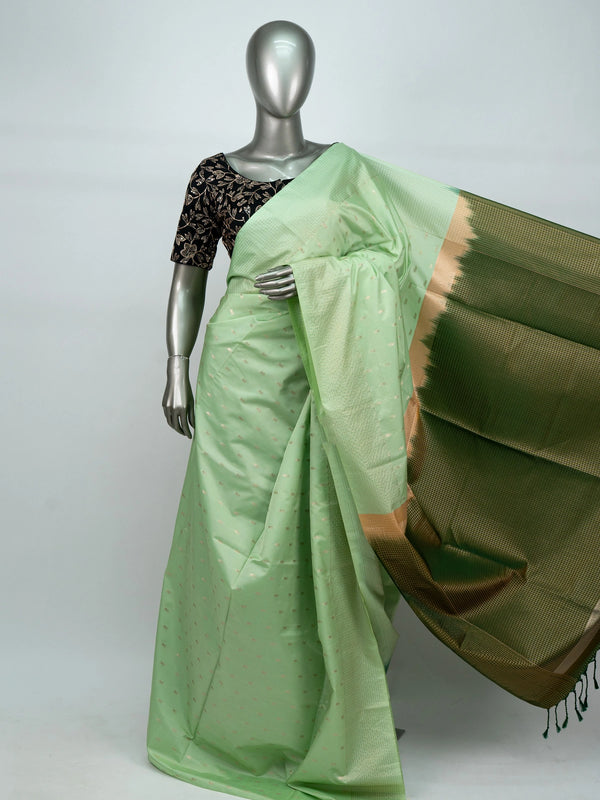 Pastel green Vaira Oosi Design semi silk saree with gold zari butis and contrast dark green zari border