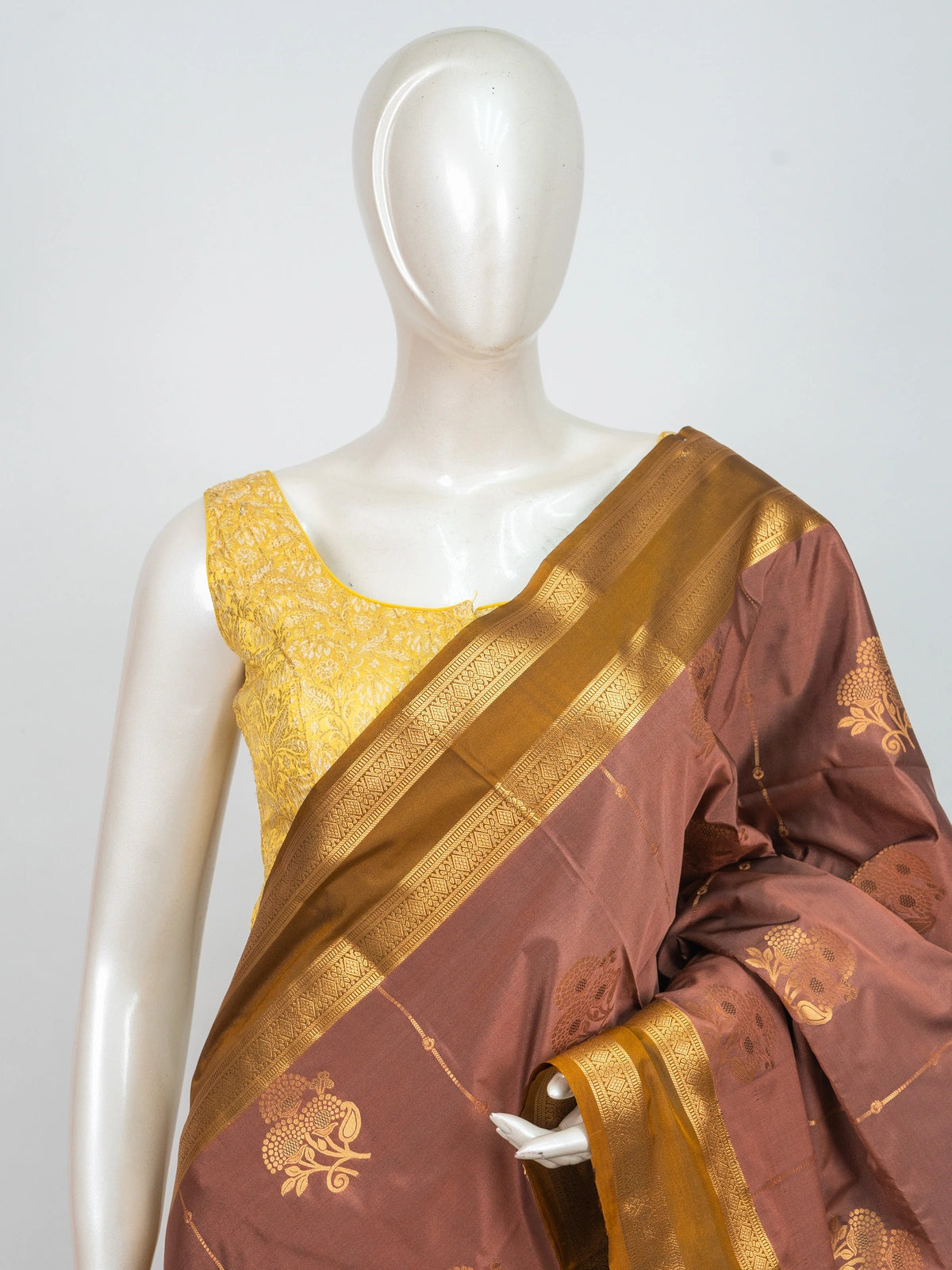 Dusty rose-brown semi silk saree with mustard-gold zari border and paisley pallu
