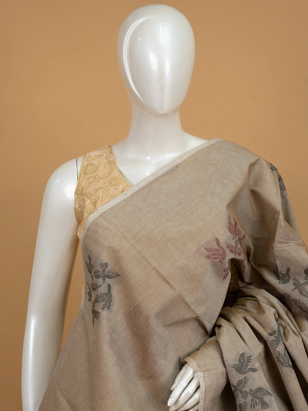 Beige silk cotton saree with grey and maroon flying-bird motifs and a bird-patterned pallu