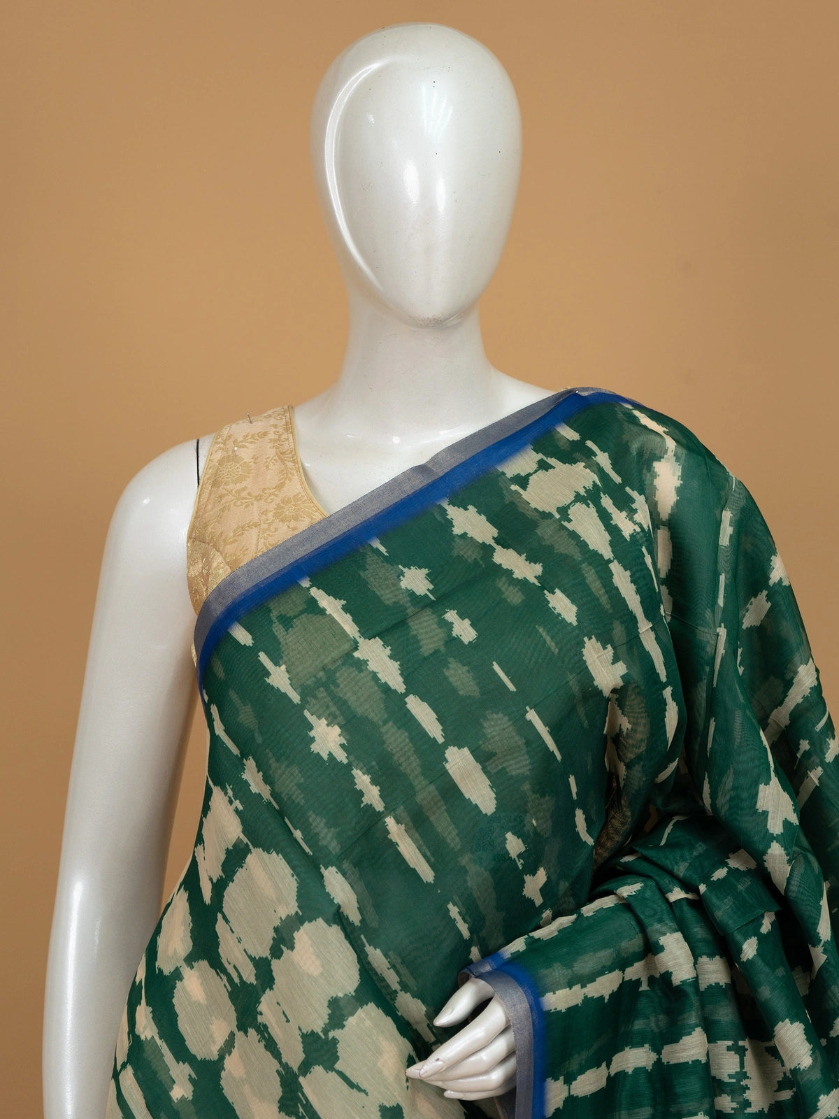 Green shibori linen cotton saree with contrast blue Kalamkari floral pallu and matching blouse