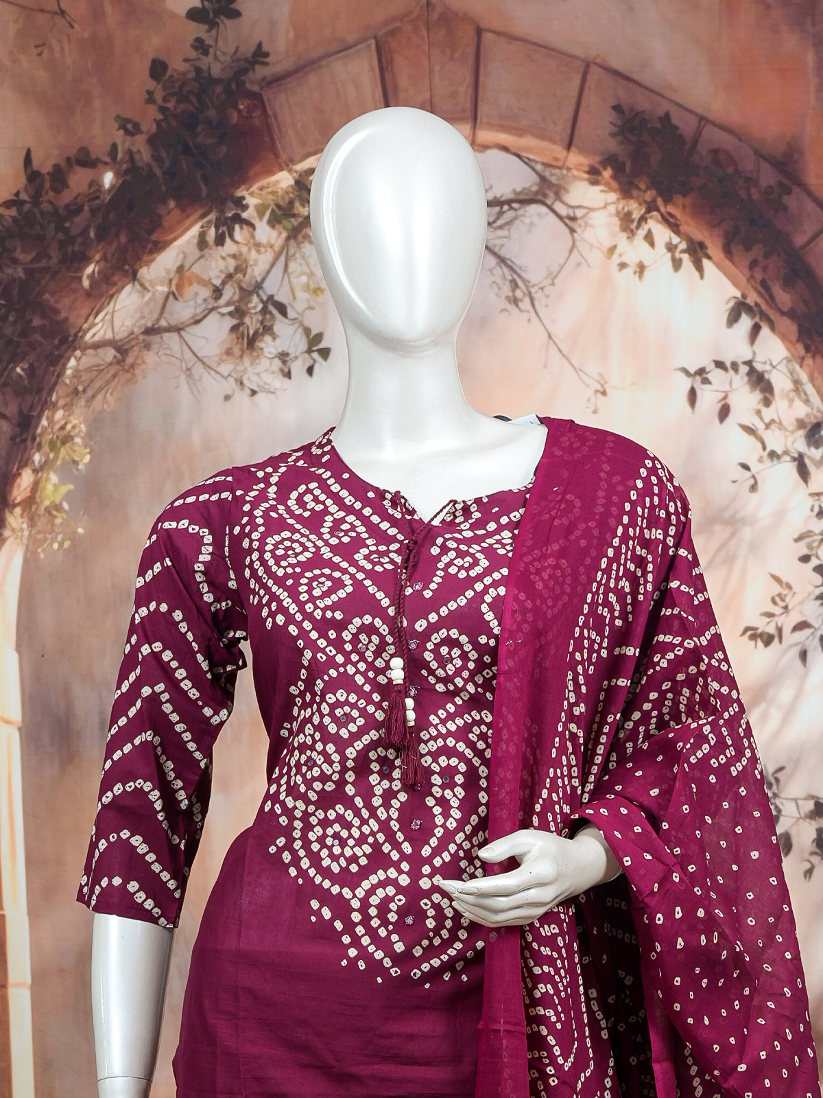 Wine and off-white Bandhani print cotton kurti set with matching pants and sheer dupatta