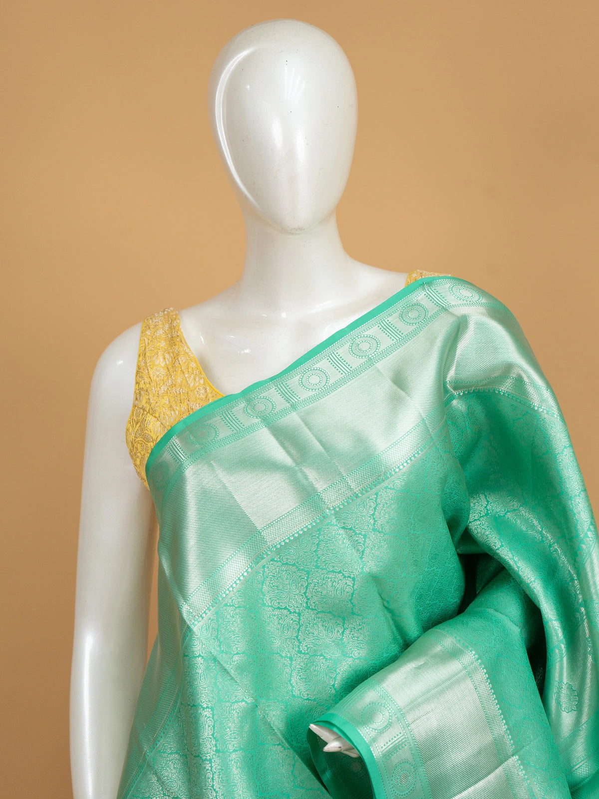 Sea green pure Kanchipuram silk saree with all-over silver zari brocade and contrast border
