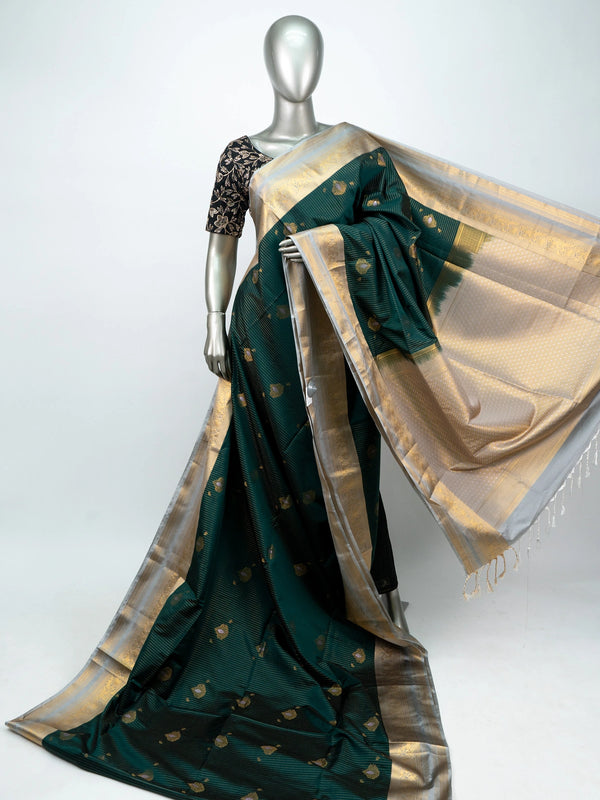 Bottle green Vaira Oosi Design semi silk saree with silver-gold zari border and contrast cream pallu