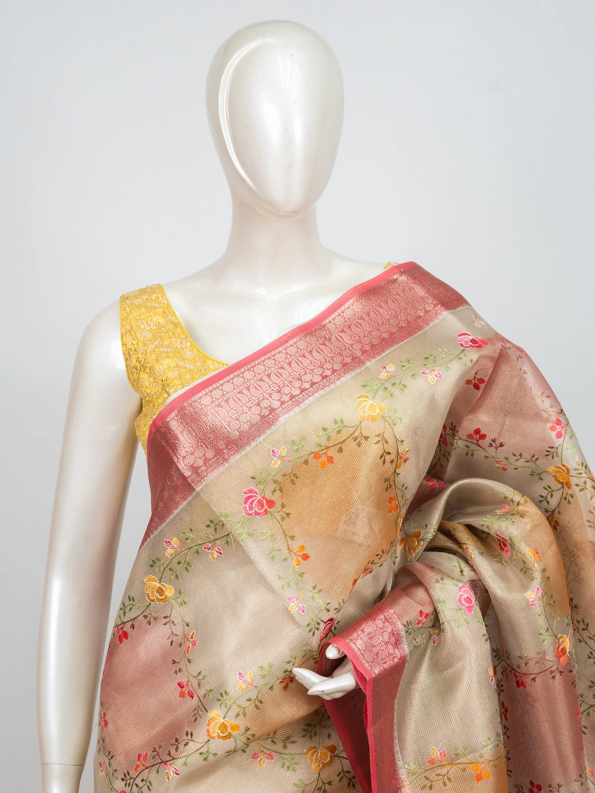 Beige and pink semi raw silk saree with multicolour floral embroidery and contrast zari border