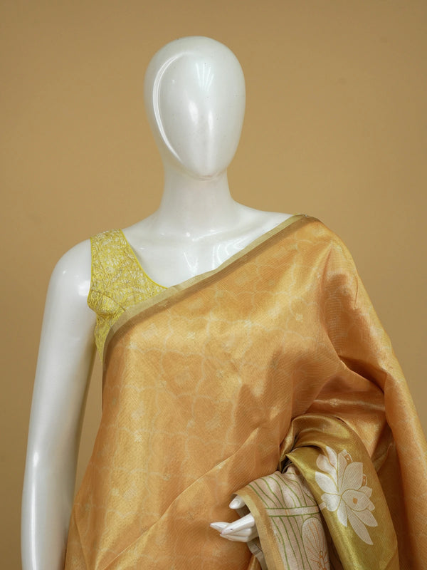 Mustard gold semi tussar saree with green lotus and crane printed pallu and gold zari border