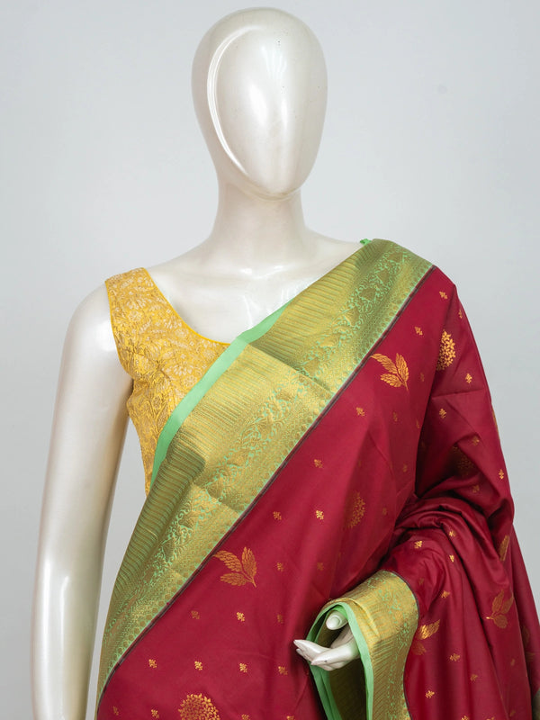 Maroon semi silk saree with gold zari buttas and contrast green zari border and pallu