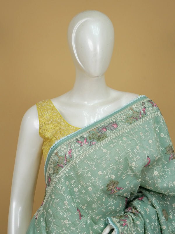 Sage green art silk designer saree with floral, bird and elephant thread embroidery and contrast aqua border