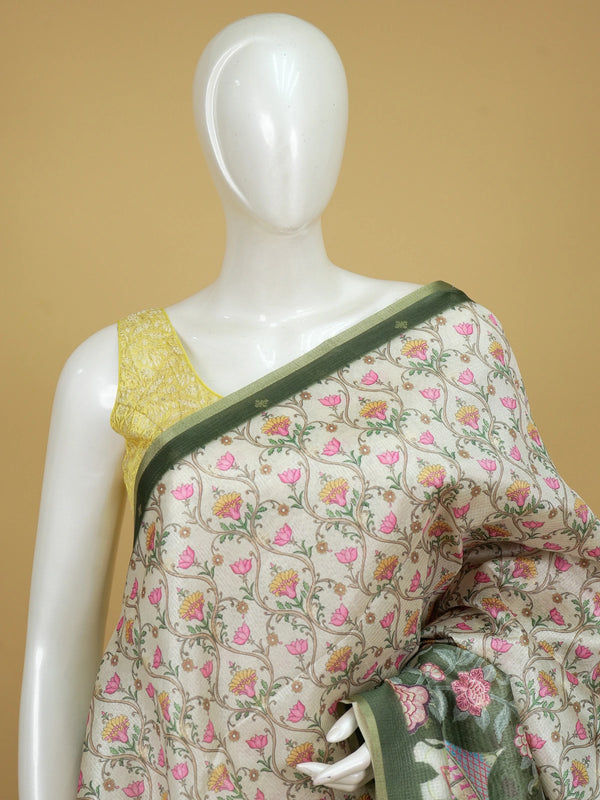 Cream semi tussar saree with floral jaal body, olive green elephant pallu and golden zari border