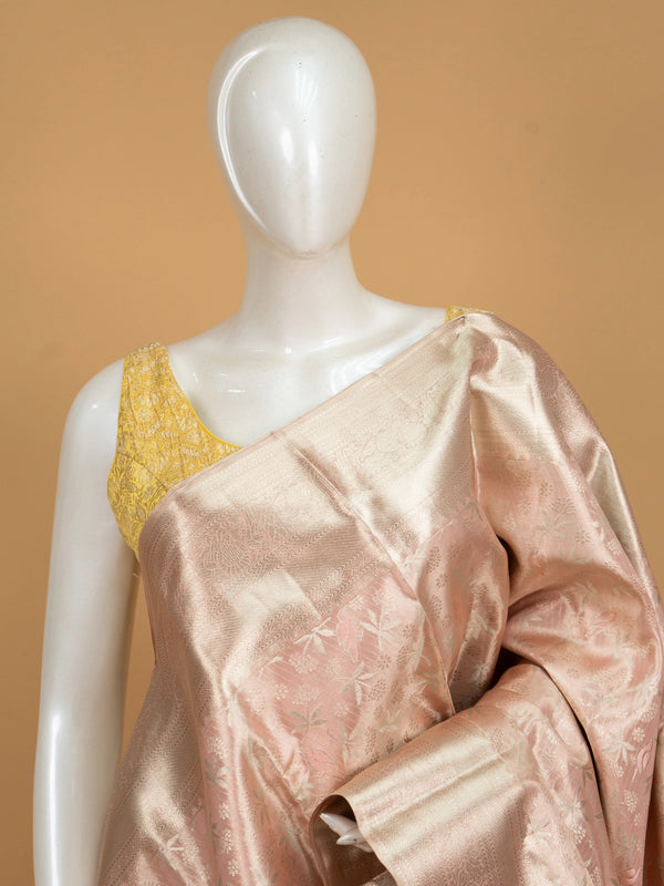 Rose pink pure Kanchipuram silk saree with silver zari floral and bird motifs and contrast zari border