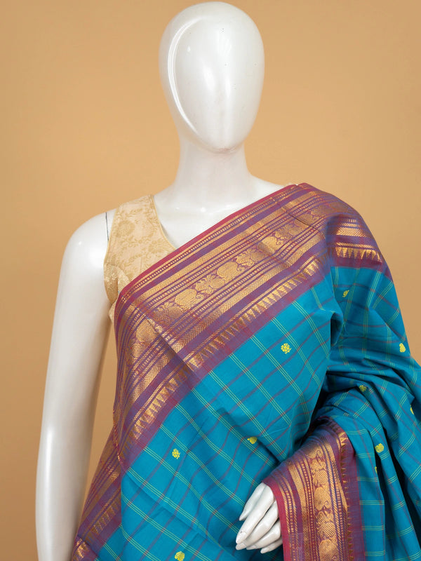 Peacock blue Chettinad cotton saree with checked body, yellow buttas and magenta gold zari border