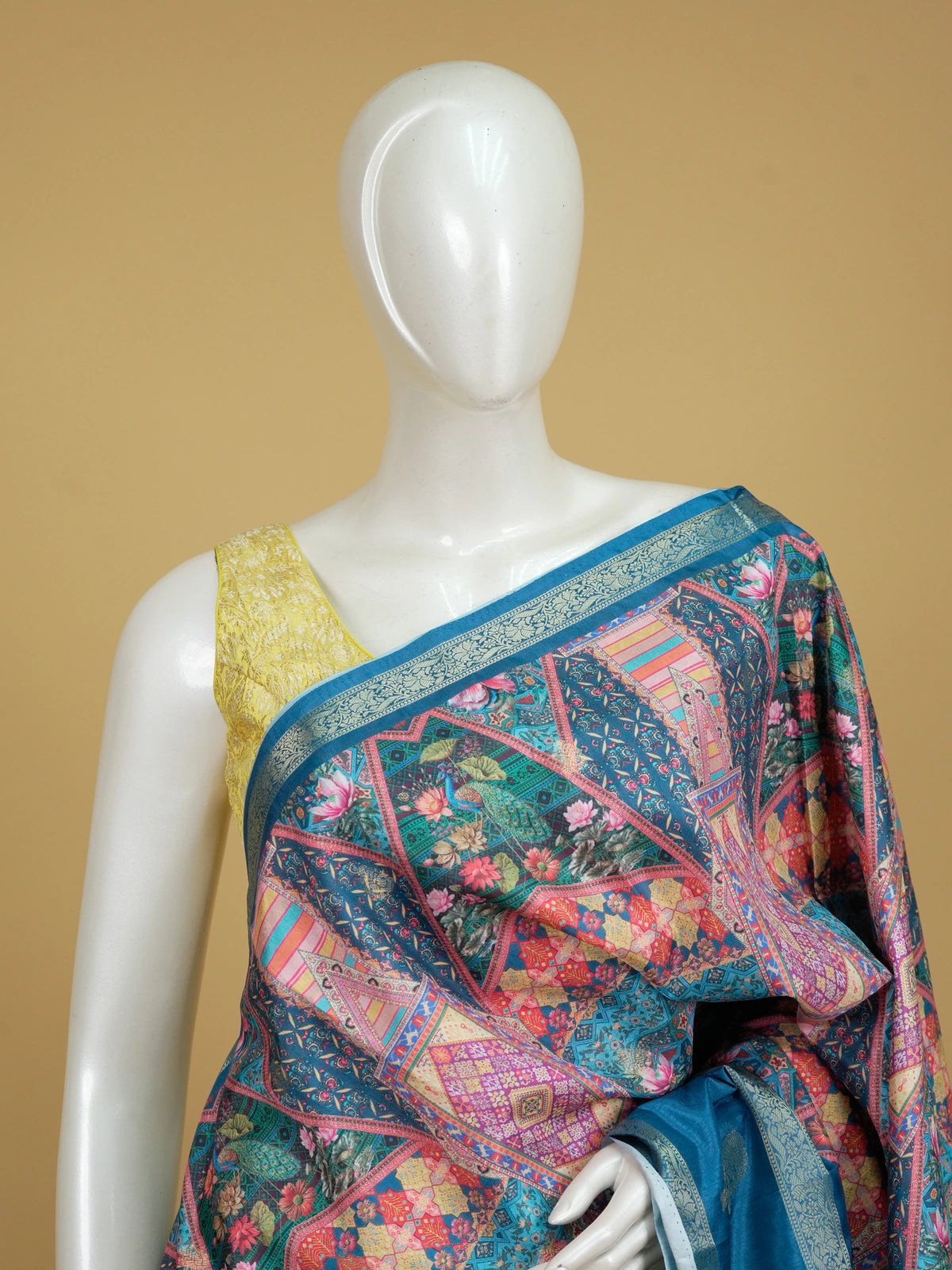 Teal blue and multicolour Dola silk saree with patchwork floral print and silver zari contrast border
