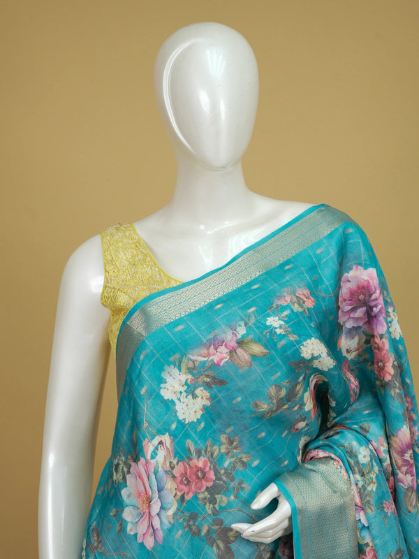 Turquoise blue floral designer saree with gold zari checks and contrast gold border