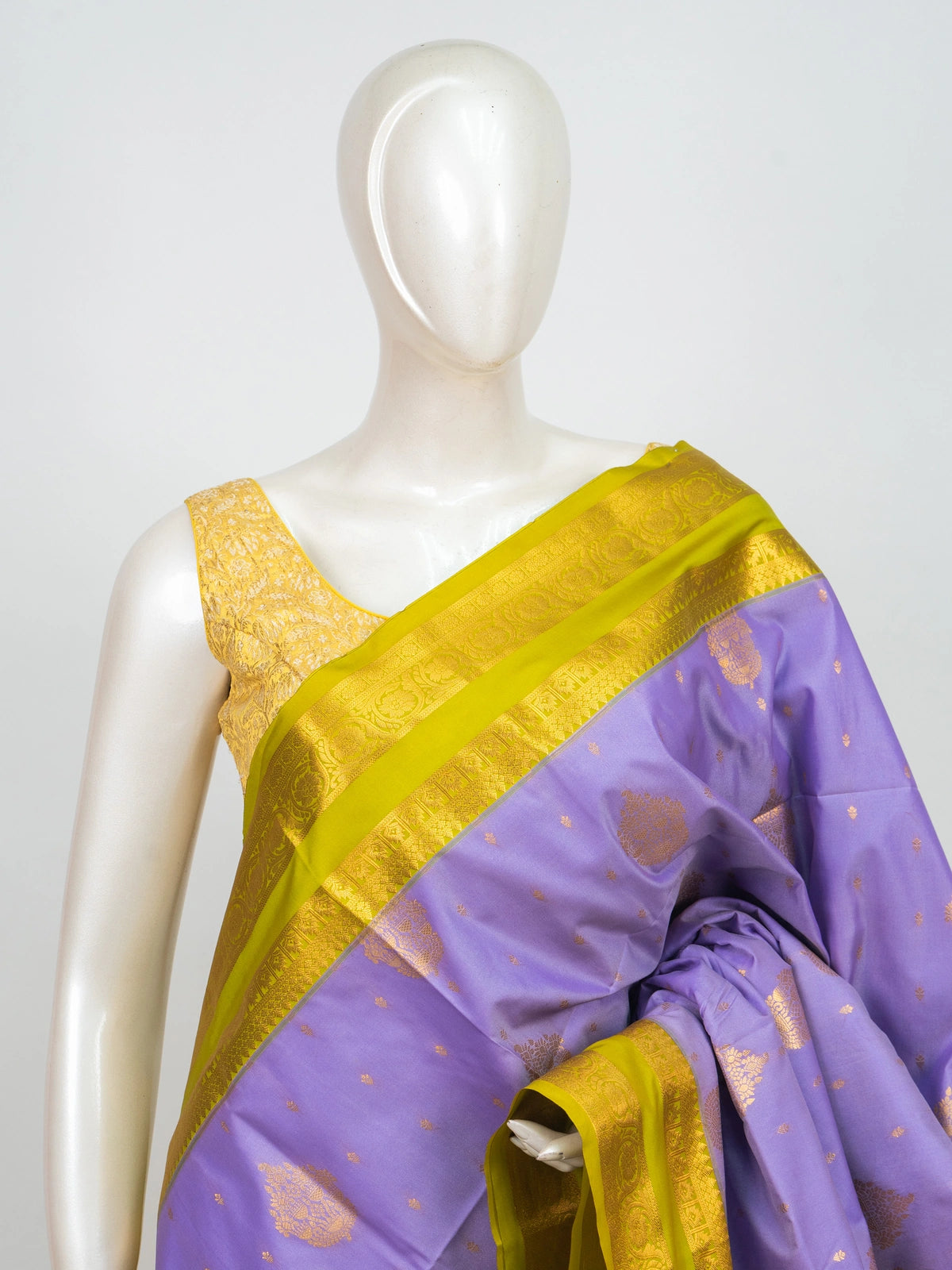 Lavender semi silk saree with contrast lime-green gold zari border and pallu