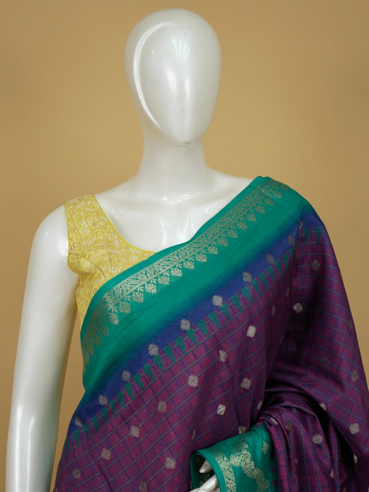 Purple Dola silk saree with teal green contrast zari border and silver zari buttas