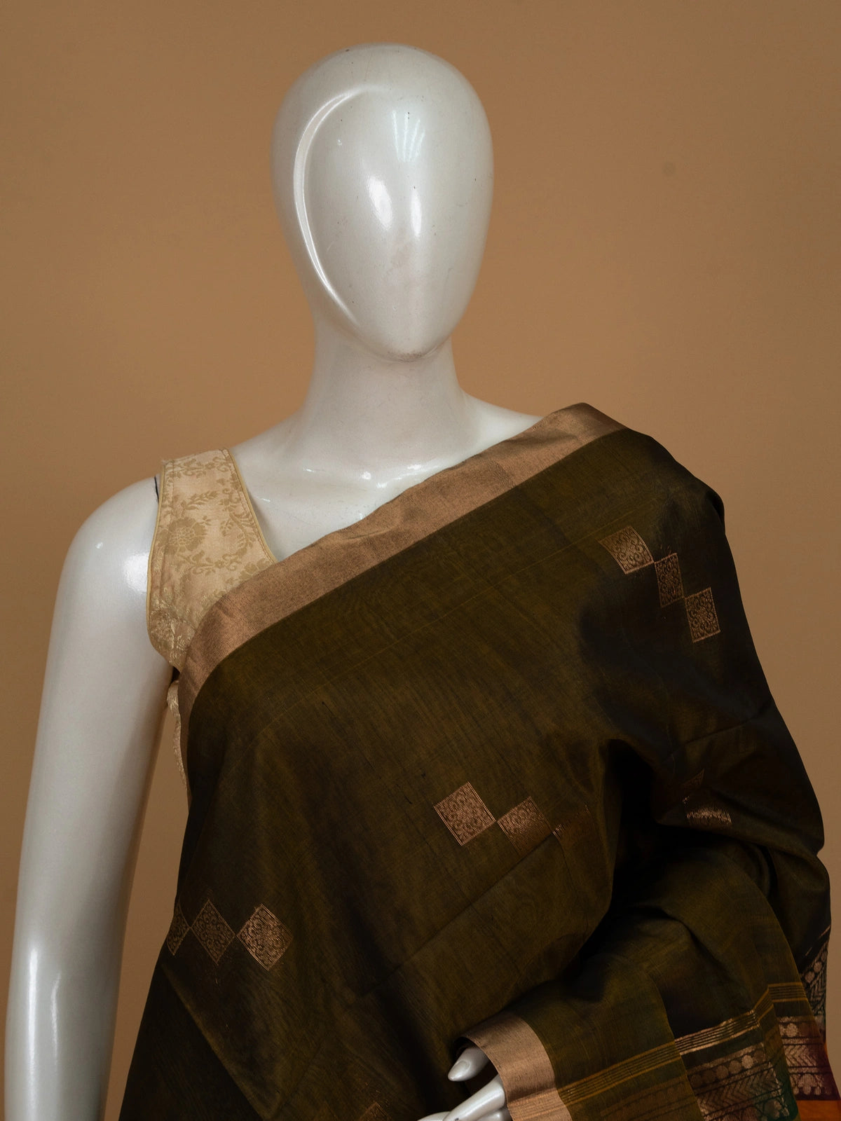 Mehendi green pure silk cotton saree with gold zari buttas and multicolour checked pallu