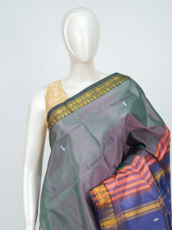 Dual-tone grey and blue banana silk saree with gold zari border and striped blue pallu