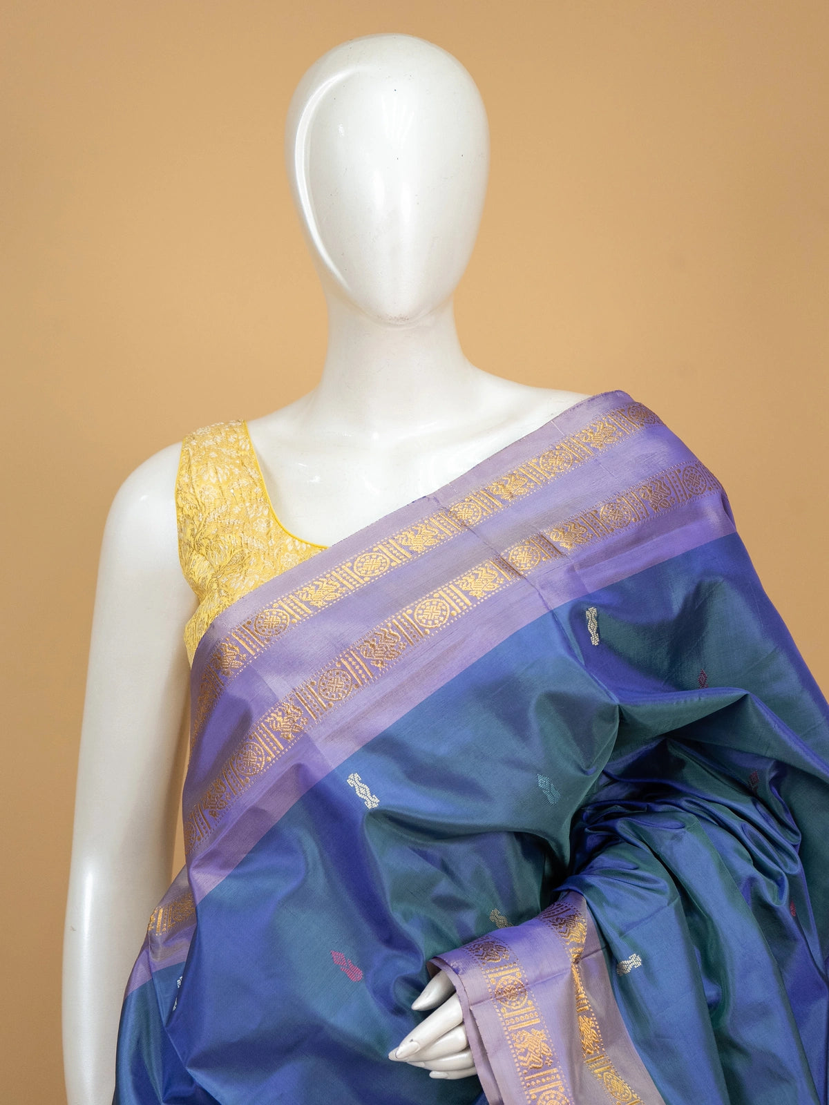Peacock blue-green banana silk saree with lavender gold zari border and cream zari pallu