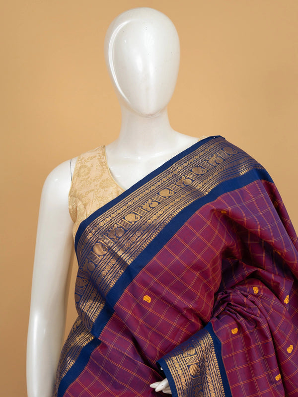 Purple Chettinad cotton saree with blue gold zari contrast border and yellow paisley buttas