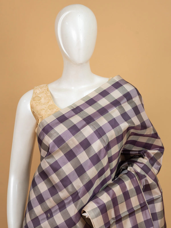 Mauve purple and cream checked banana silk saree with contrast cream pallu and woven paisley motifs