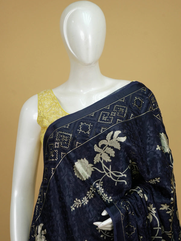 Navy blue designer saree with gold floral print, lotus pallu motifs and patola geometric border