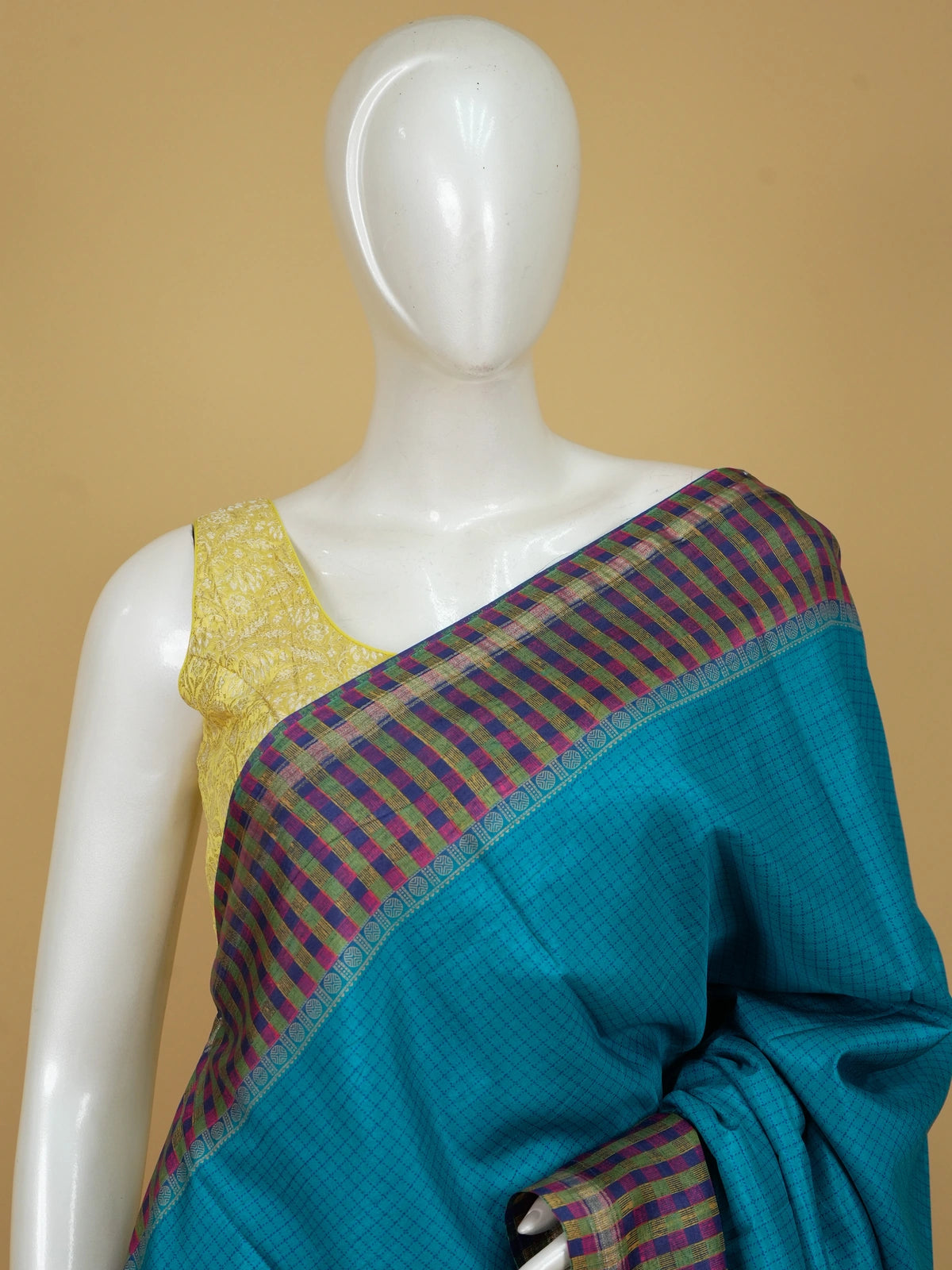 Peacock blue Dola silk saree with contrast multicoloured checked border and patterned pallu