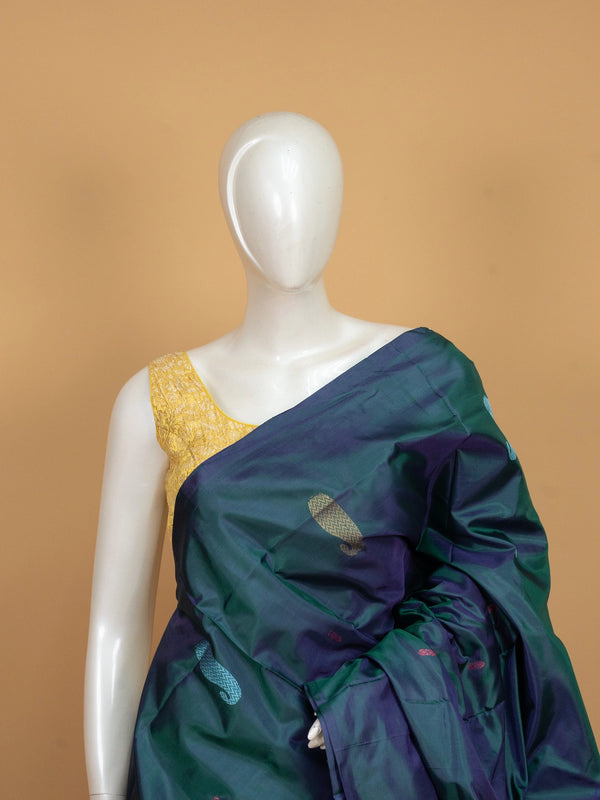 Teal green and pink banana silk saree with paisley buttas and contrast pink pallu