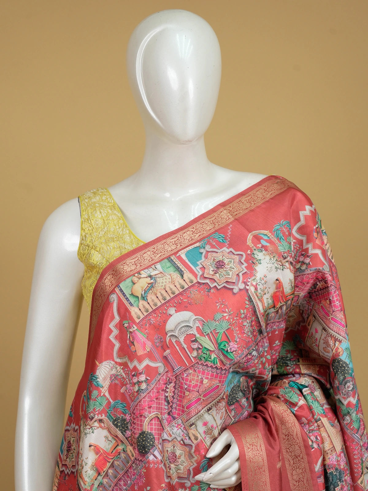 Coral pink Dola silk saree with Mughal-inspired multicolour print and gold zari border