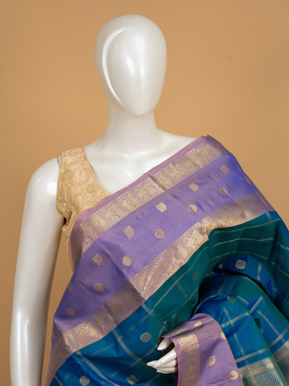 Peacock blue pure Kanchipuram silk saree with gold zari checks and contrast lavender zari border