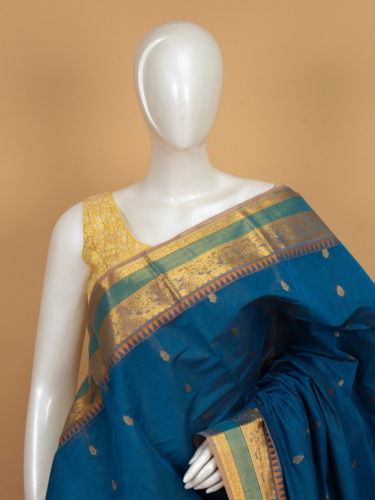 Peacock blue Chettinad cotton saree with gold zari buttas, temple zari border and contrast mustard-gold pallu