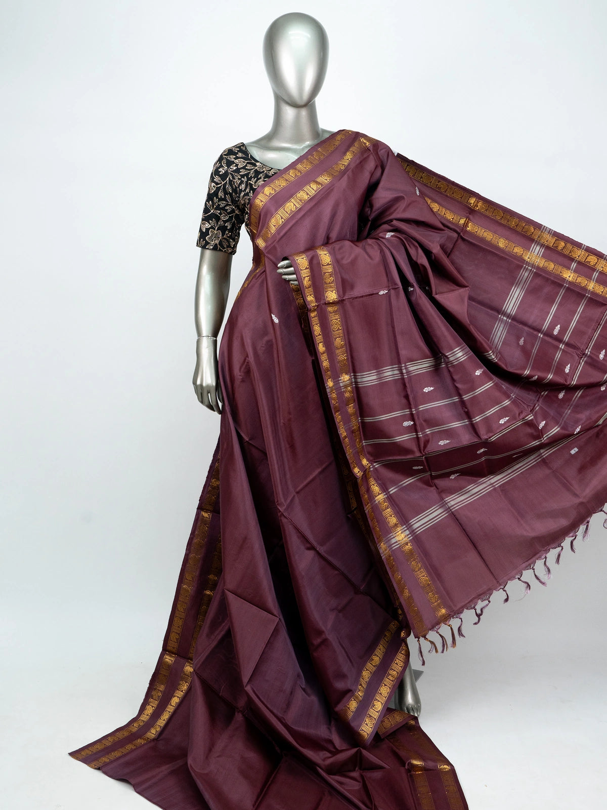 Wine maroon banana silk saree with gold zari border, silver buttas and contrast black blouse