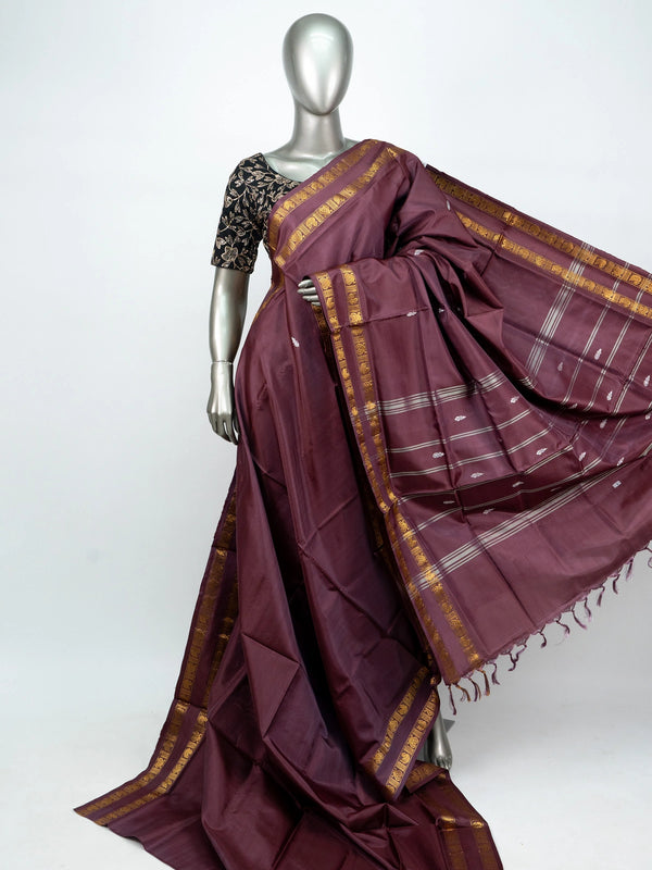 Wine maroon banana silk saree with gold zari border, silver buttas and contrast black blouse