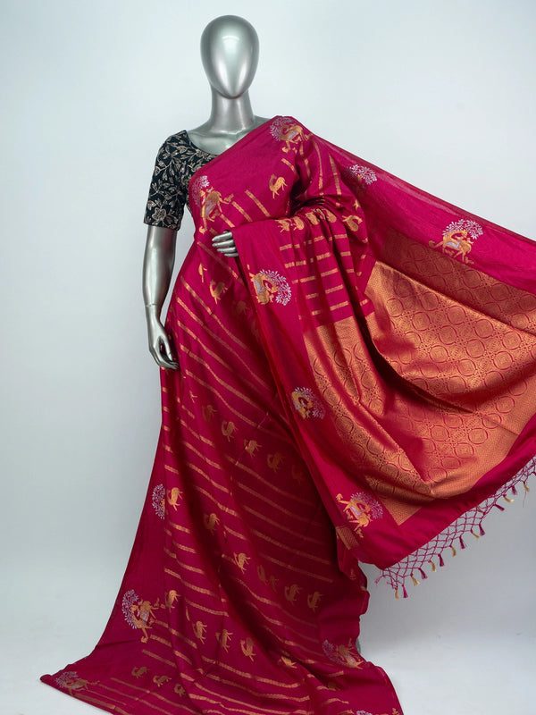 Rani pink semi raw silk saree with gold zari folk motifs, brocade pallu and contrast black blouse