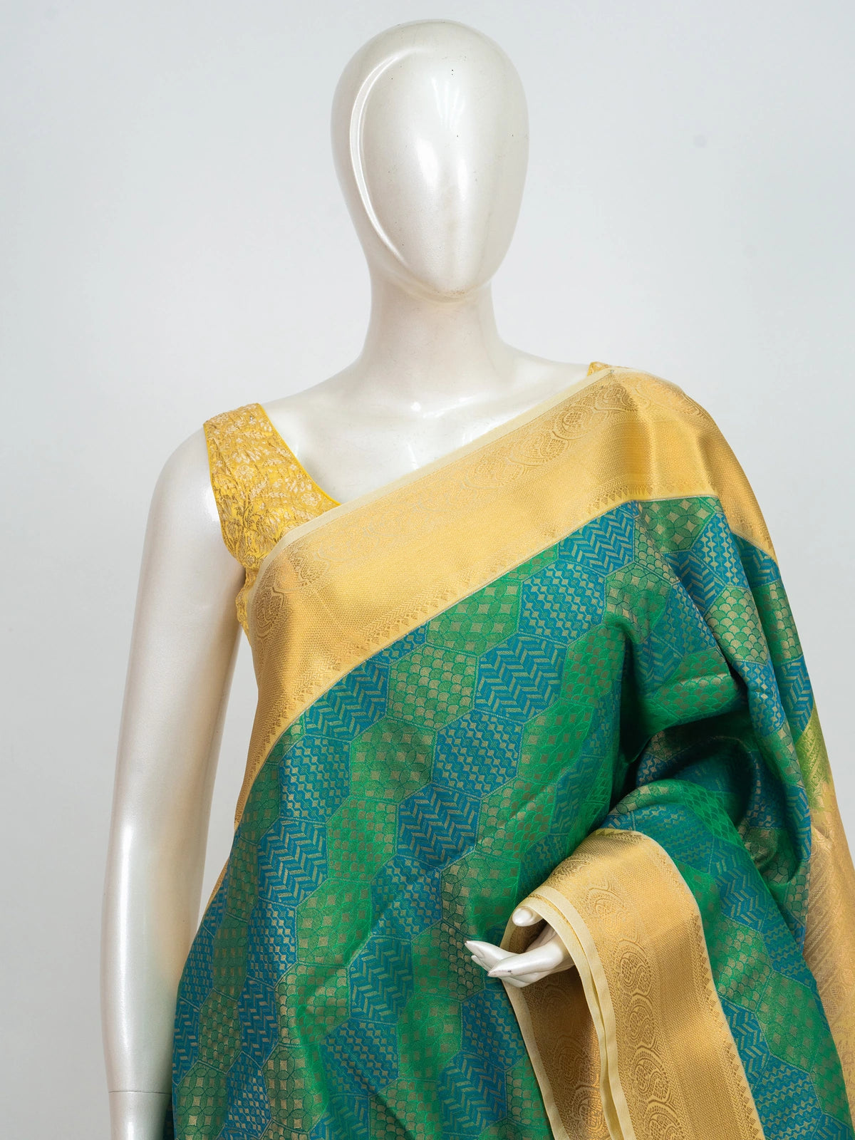 Green and gold Kanchipuram Fancy Silk saree with contrast gold zari border and woven pallu
