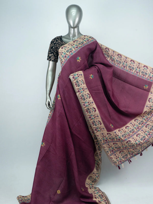 Wine purple linen cotton saree with beige folk-art elephant border and black embroidered blouse