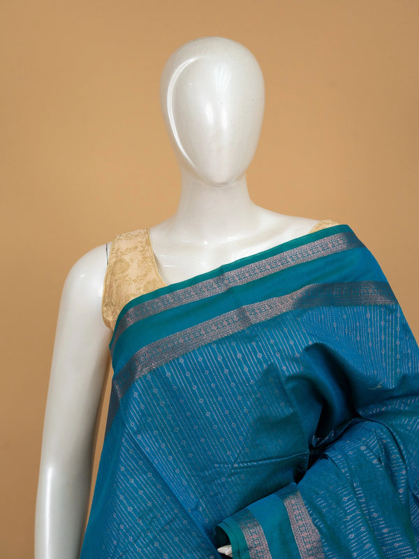 Peacock blue silk cotton saree with silver zari stripes and contrast maroon zari pallu