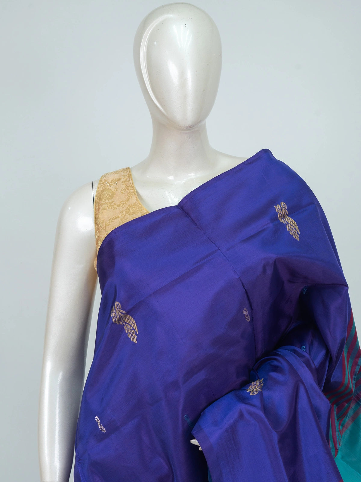 Royal blue and teal Banana Silk saree with gold zari buttis and contrast striped pallu