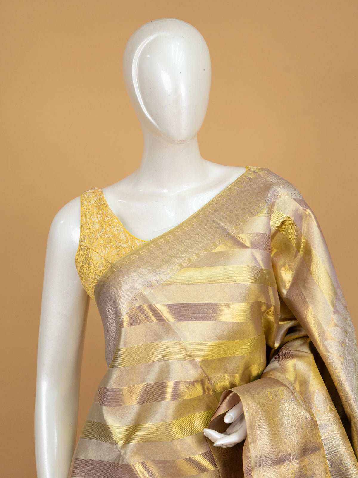 Gold and lilac pure Kanchipuram silk saree with diagonal zari stripes and floral zari border