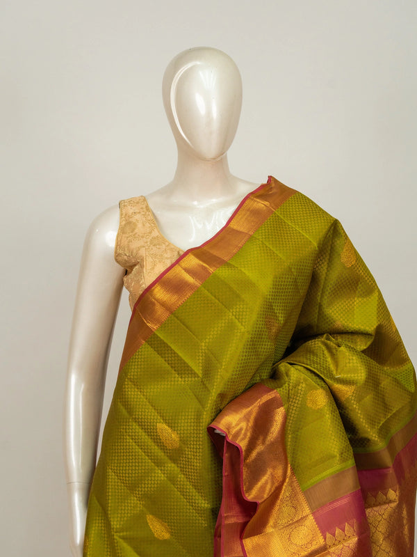Mehendi green pure Kanchipuram silk saree with contrast pink gold zari border and pallu