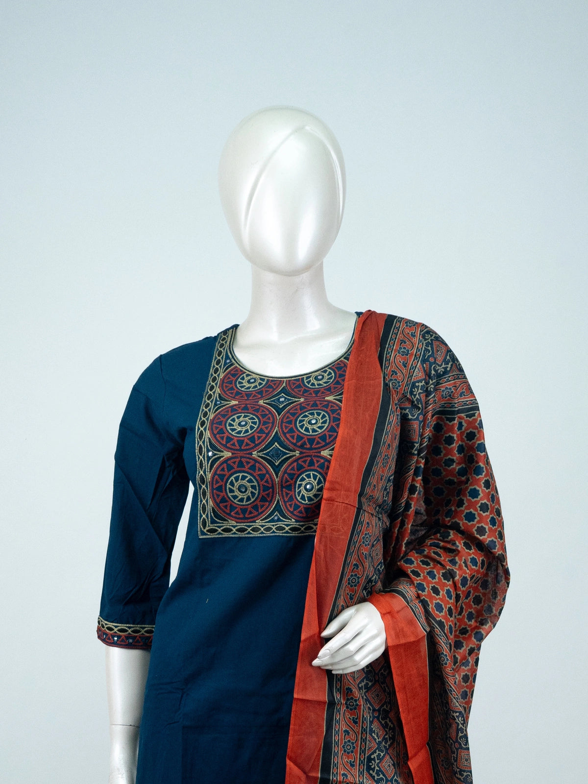 Navy blue cotton straight-cut kurti set with mirror-embroidered yoke and rust Ajrakh-print dupatta