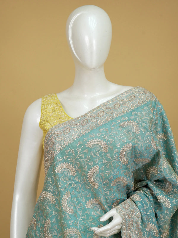 Sea green designer saree with allover gold zari floral and paisley embroidery and embellished border