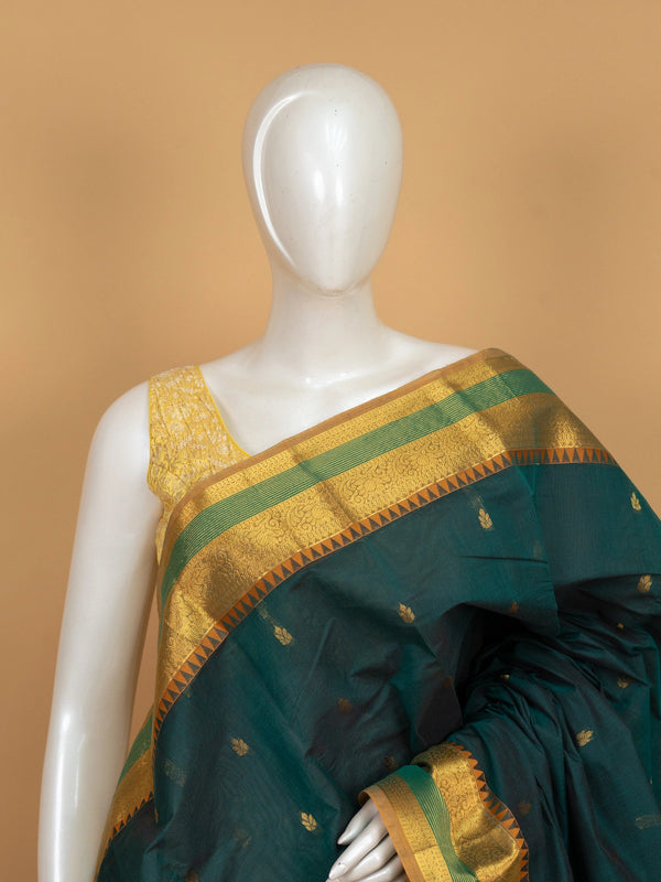 Teal green Chettinad cotton saree with gold zari buttas, temple border and contrast maroon zari pallu