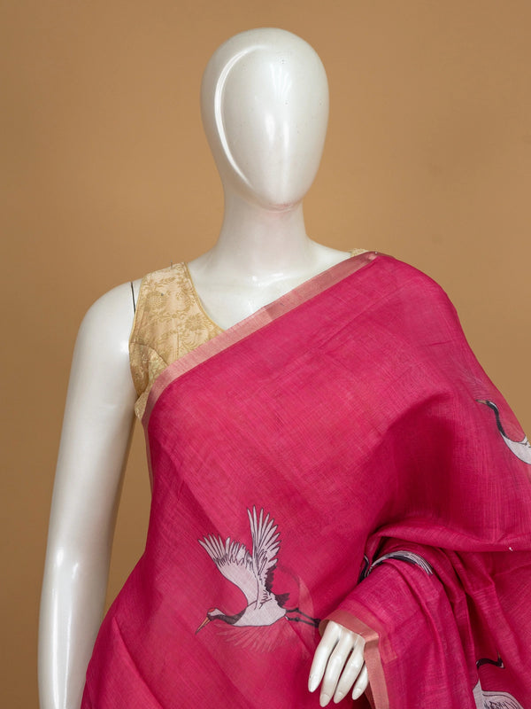 Rani pink linen cotton saree with white flying crane prints, tonal circles and a thin gold zari border